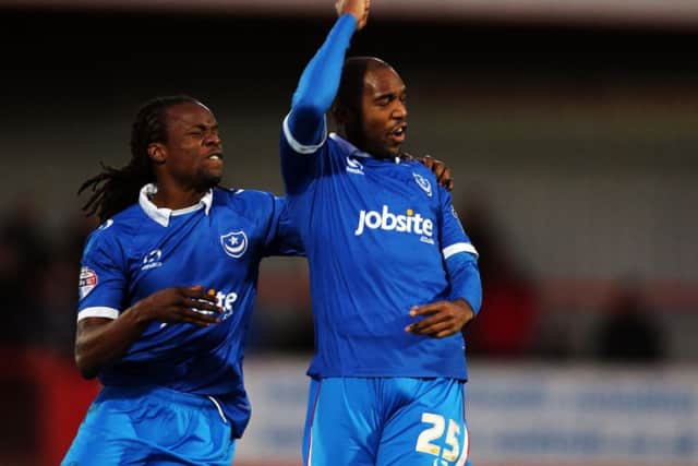 Nigel Atangana celebrates his goal with Marcus Bean, left. Picture: Joe Pepler