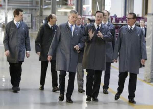 David Cameron at the plant
Steve Parsons/PA Wire