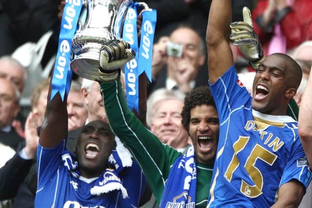 David James, centre, celebrates lifting the Cup in 2008