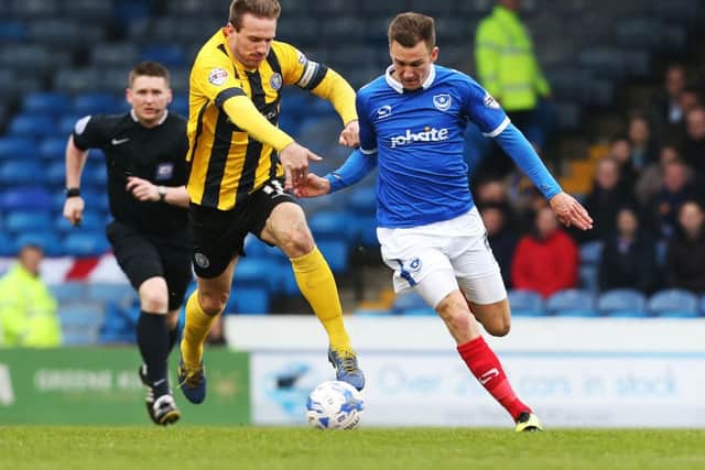 Liam Lawrence holds off Jed Wallace. Picture: Joe Pepler