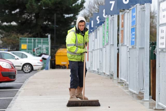 BUSY Recycling operative Nathan Brien at the Havant centre soon after it reopened in 2013