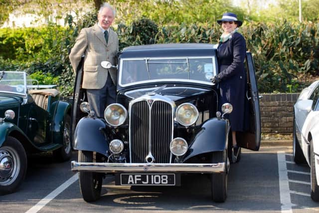 Nigel and Julie Peachey with their 1934 Rover 12 Sportsman Saloon.The Mayor of Havants Charity Classic Vehicle Run, The Plaza, Havant. Picture: Allan Hutchings (150712-164)
