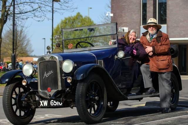 Sandra Wise and her husband John Wise, with their 1924 Austin 12/4 Clifton car. The Mayor of Havants Charity Classic Vehicle Run, The Plaza, Havant. Picture: Allan Hutchings (150712-152)