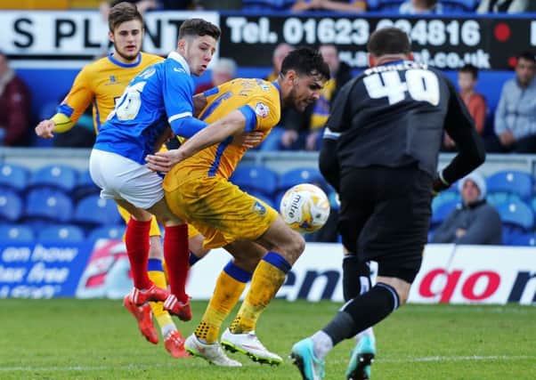 Conor Chaplin in action for Pompey against Mansfield last weekend Picture: Joe Pepler