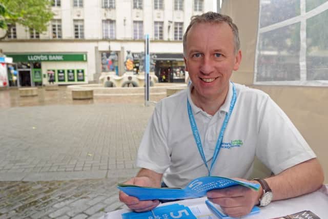 Dementia support worker Cliff Cropley at the Alzheimer's contact point in Commercial Road, Portsmouth
Picture: Ian Hargreaves (150846-6)