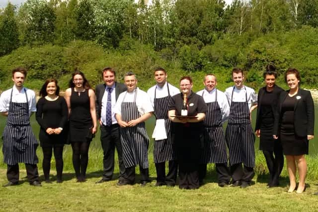 Staff from The Langstone who took part in the tray race