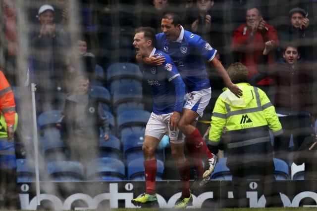 Jed Wallace celebrates after turning agony into ecstasy against Exeter City this season. Picture: Joe Pepler
