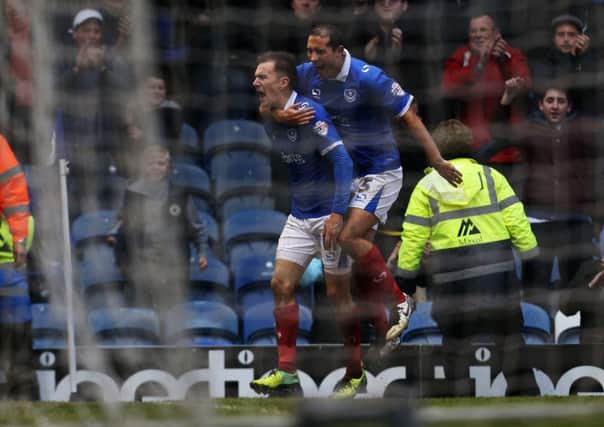 Jed Wallace celebrates after turning agony into ecstasy against Exeter City this season. Picture: Joe Pepler