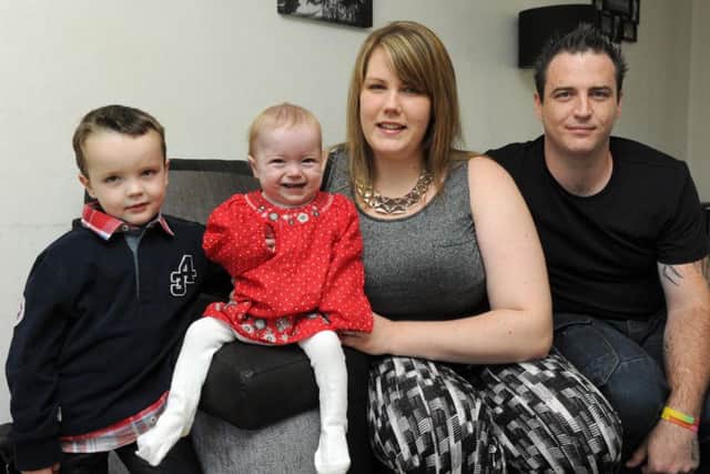 Parents Dan Sapio and Cara Hunter with their children Harvey, four, and Grace, who passed away three months before her second birthday.  Picture: Paul Jacobs
