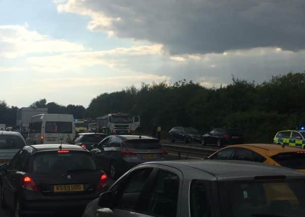 Traffic at a standstill as emergency services attend a crash on the A27 which has closed the Chichester bypass SUS-150806-172648001
