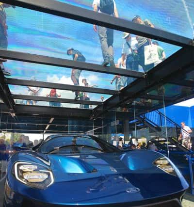 Ford stand exclusive new GT40 with people looking down. PICTURE BY MICHAEL REED