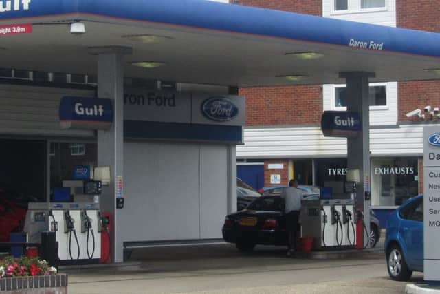 The Daron Ford garage, Hayling, which a car crashed into. The right-hand window was broken and is now covered with a white board