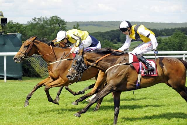 Big Orange and Jamie Spencer get home first in the Qatar Goodwood Cup / Picture by Malcolm Wells