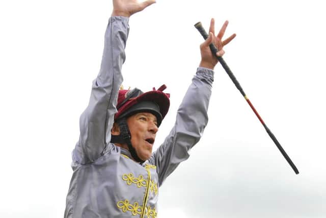 Frankie Dettori flies from his horse - he's performed this four times in four days of the festival / Picture by Malcolm Wells