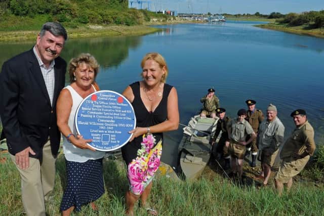 Major Ian Mattison with Harold Gouldings granddaughters Jill Goulding and Sue Garrahy and part of the canoe flotilla