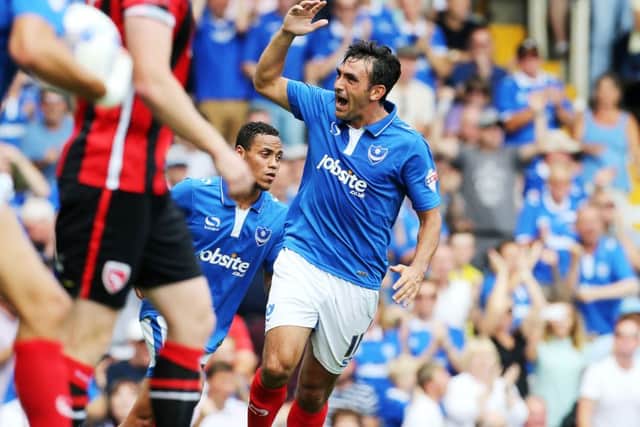 Gary Roberts scored twice as 10-man Pompey earned a point after falling 3-0 behind to visitors Morecambe   Picture: Joe Pepler