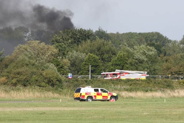 DM156571a.jpg Shoreham Airshow 2015. Crash. Photo by Derek Martin SUS-150822-174523008