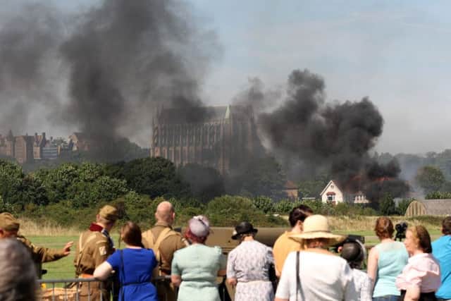 DM156584a.jpg Shoreham Airshow 2015. Crash. Photo by Derek Martin SUS-150822-180541001