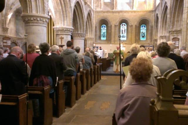 Father Paul Rampton leading the special service at St Mary de Haura Church this morning