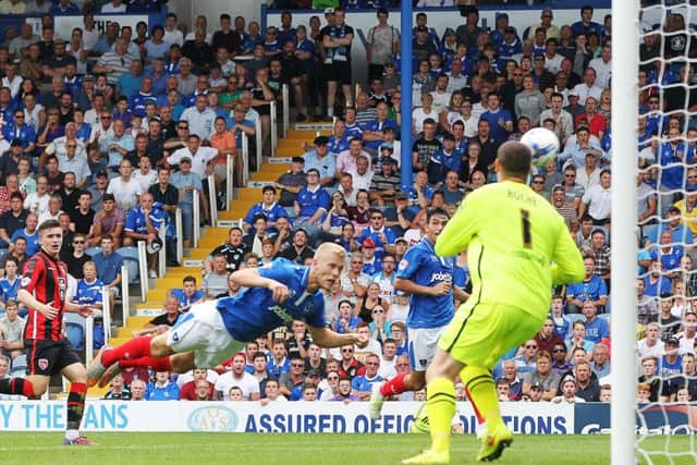 Jayden Stockley heads home the equaliser. Picture: Joe Pepler