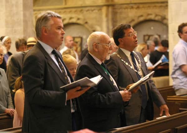 MP Tim Loughton, front left, at the church service at St Mary's, Shoreham. Photo by Derek Martin SUS-150823-123047008