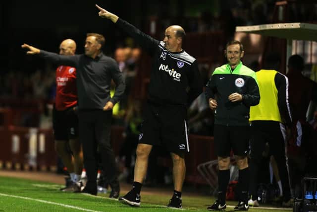 Paul Cook is working to put a good scouting system in place at Pompey. Picture: Joe Pepler