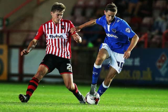 Adam May on the ball against Exeter. Picture: Joe Pepler