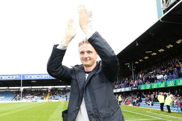 Former Pompey attacker Erik Huseklepp is applauded on to the Fratton Park pitch at half-time in the Blues' 0-0 draw with Accrington on Saturday   Picture: Joe Pepler