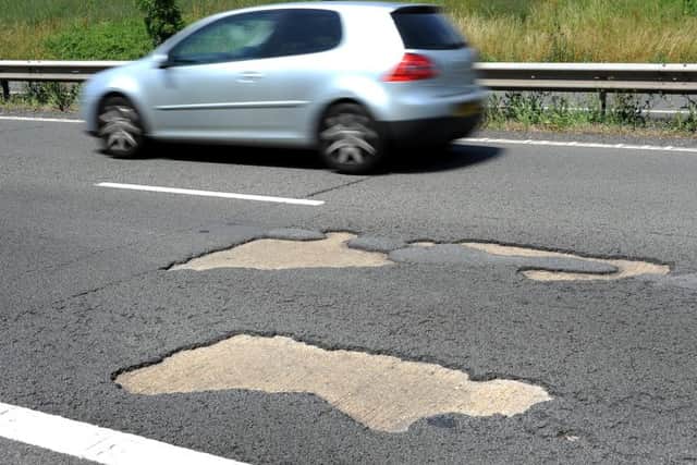 The potholes on the busy stretch of road have now been filled