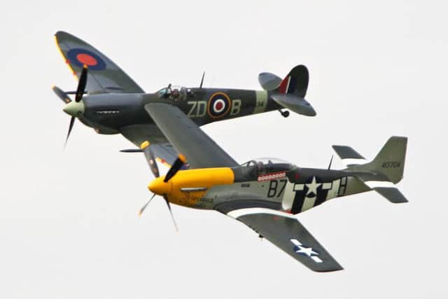 The famous WWII planes are a major draw. Photo by Derek Martin SUS-151109-222311008