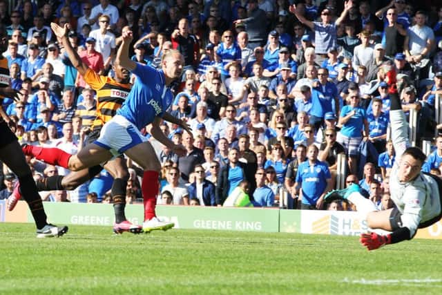 Adam McGurk scores in the second half to give Pompey the lead against Barnet Picture: Joe Pepler