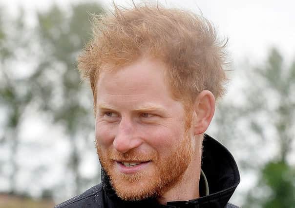 Prince Harry, at Goodwood Aerodrome in West Sussex, during his 31st birthday, prior to taking part in the Battle of Britain Flypast to mark the 75th anniversary of victory in the Battle of Britain.
Picture:: John Stillwell/PA Wire PPP-150915-114247001