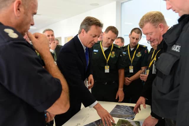 Prime Minister David Cameron meets emergency services staff who attended the Shoreham air crash Pictures: Georgina Coupe