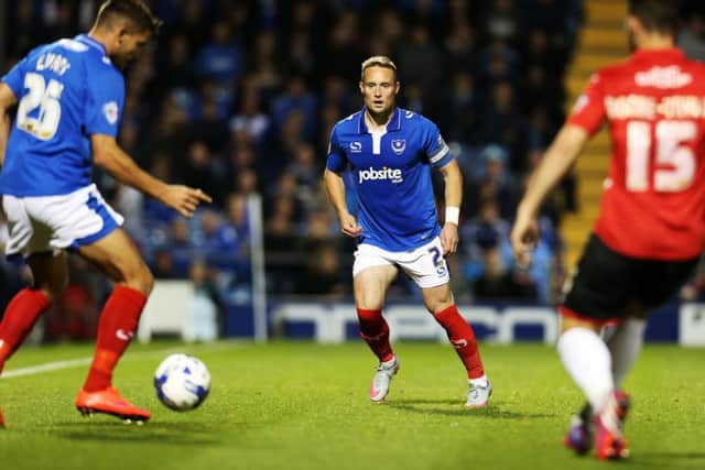Pompey defender Ben Davies, centre    Picture: Joe Pepler