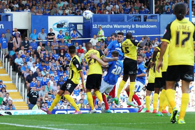 Gareth Evans scores the opener against Dagenham & Redbridge on the first day of the season Picture: Joe Pepler