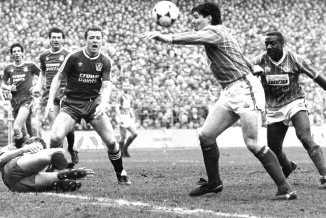 Mick Quinn playing for Pompey v Liverpool in February 1988
