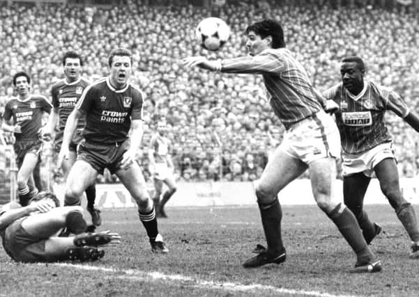 Mick Quinn playing for Pompey v Liverpool in February 1988