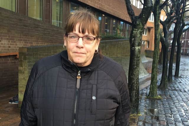 Victim Angie Squires, who says she is glad that Paul Smith is out of her life