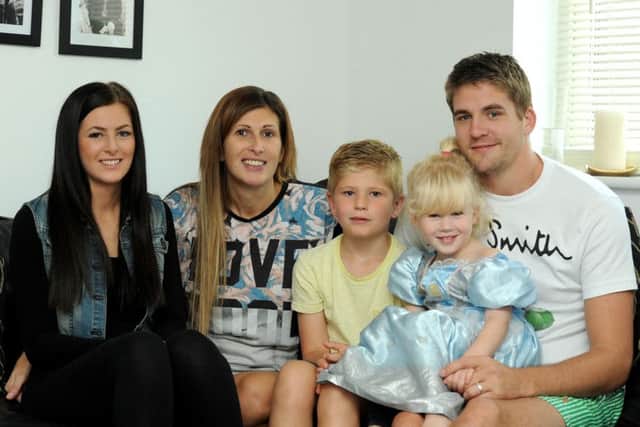 Clare Baillie with her children Lucy, Evie-Mae and Albie and husband Kane