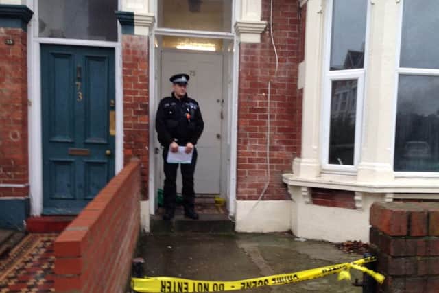 A policeman guards a house in Waverley Road as part of the investigation into the death of Christopher Butler