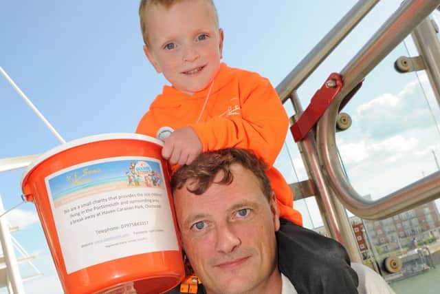 Sam Merrick with his dad Paul