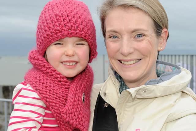 Kate Russell from Southsea, partner of Iron Duke Commander Ben Aldous with their daughter Mia Aldous (3)