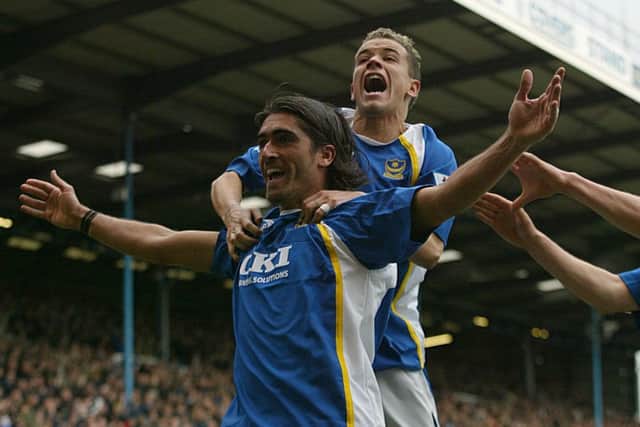 Pedro Mendes celebrates scoring against Manchester City in March 2006