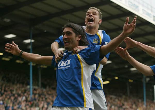 Pedro Mendes celebrates scoring against Manchester City in March 2006
