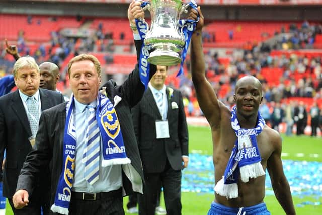 Portsmouth manager Harry Redknapp celebrates with Lassana Diarra after Pompey win the FA Cup