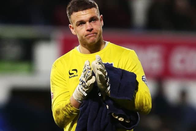 Brian Murphy looks dejected after Pompey's FA Cup draw at Ipswich Picture: Joe Pepler