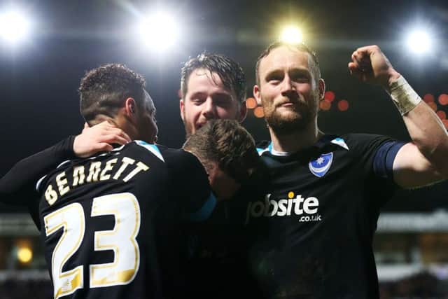 The Pompey players celebrate at Portman Road Picture: Joe Pepler