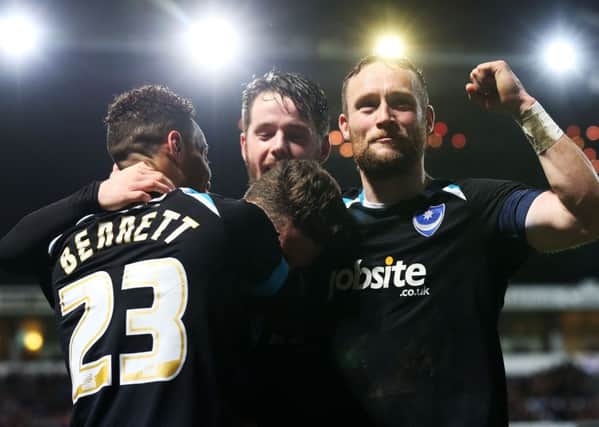 The Pompey players celebrate at Portman Road Picture: Joe Pepler