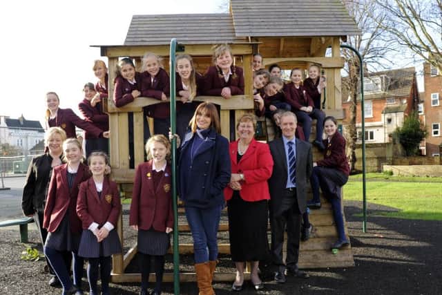 Actress Sarah Parish (centre) with pupils from Portsmouth High School Junior School together with (left) music teacher Becky Hill, Portsmouth High School head Jane Prescott and Paul Marshallsay, head of the Junior School