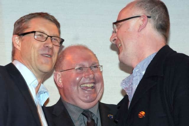 The News's editor Mark Waldron and Portsmouth College principal Steve Frampton congratulate last year's Special Achievement Award winner Geoff Priestley of the Wedgewood Rooms
